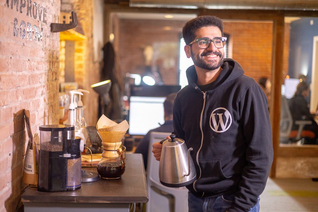 Ricky Angeles making coffee at Improve and Grow, LLC